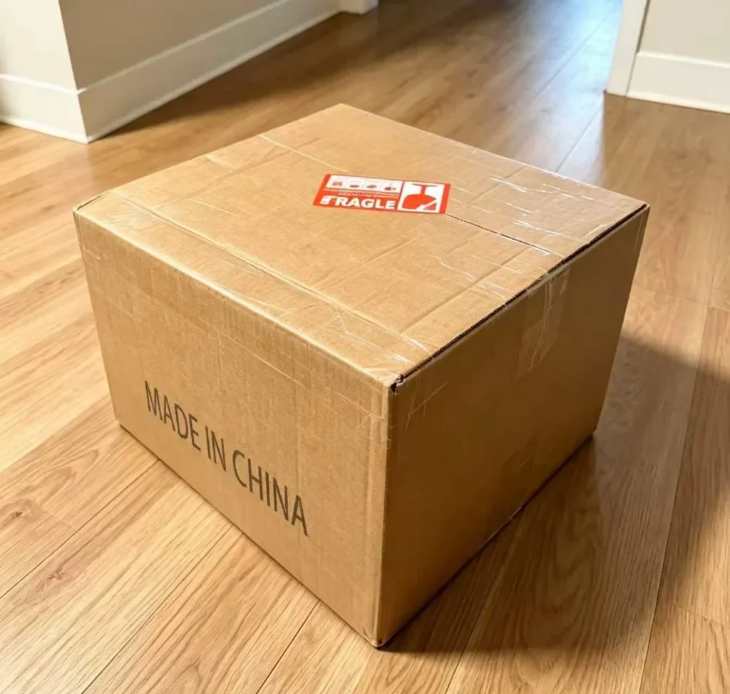 A sealed export carton with handling or identification labels.