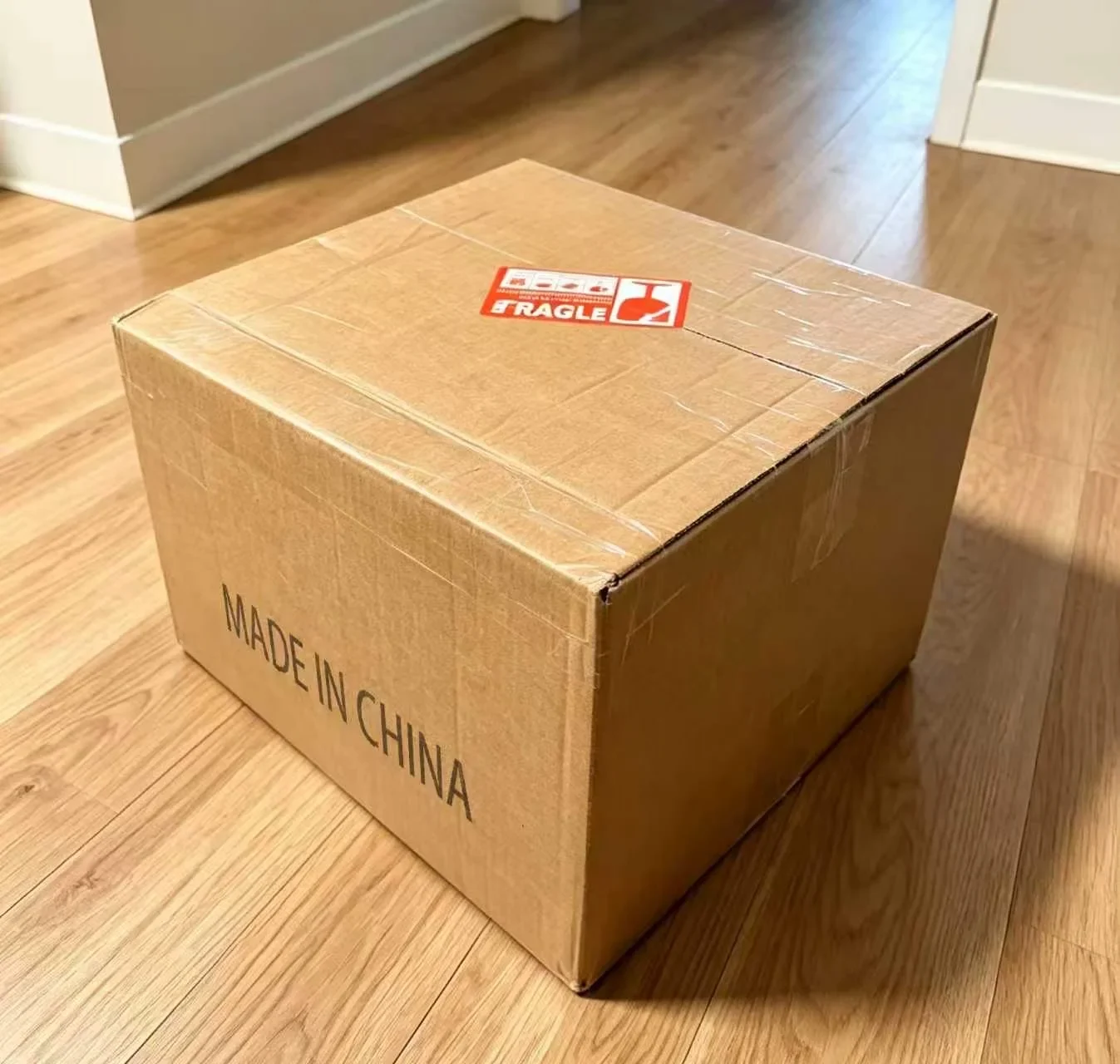 A sealed export carton with handling or identification labels.
