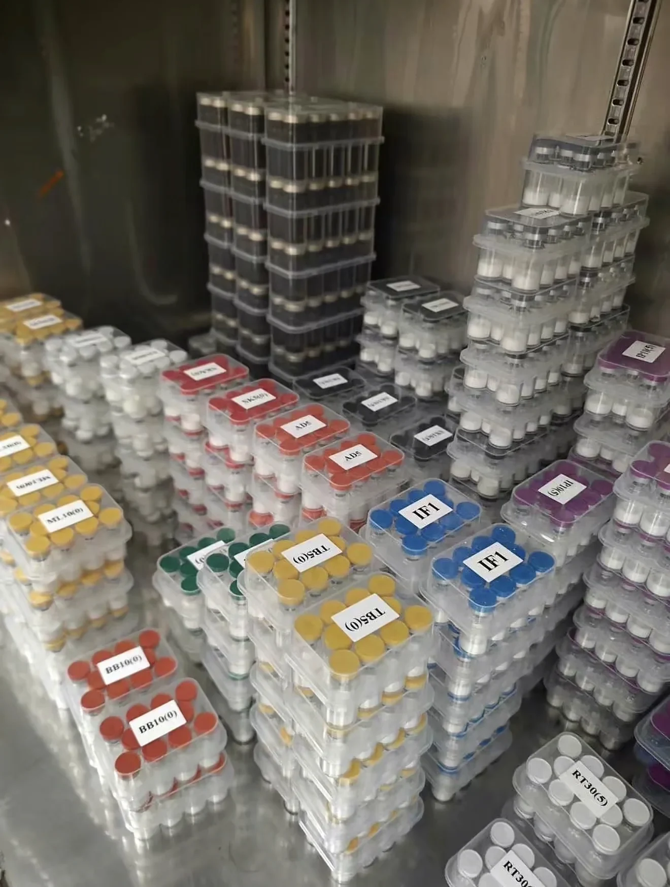 Small packaged products held together in a stock area.
